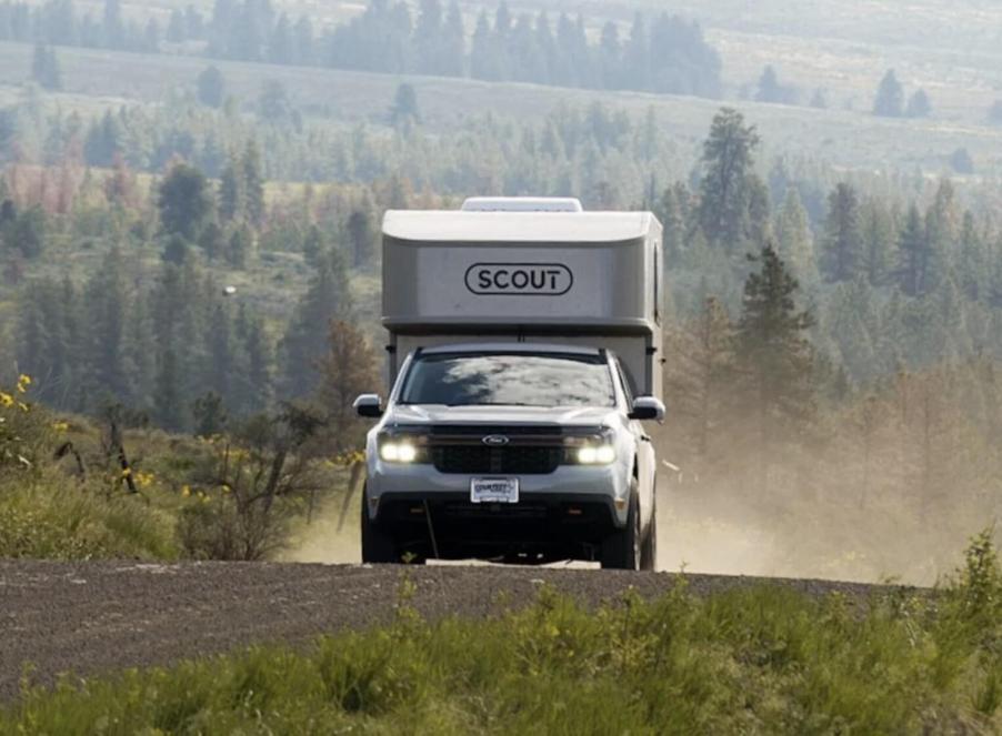 The 2023 Ford Maverick with the Scout Tuktut camper on the road