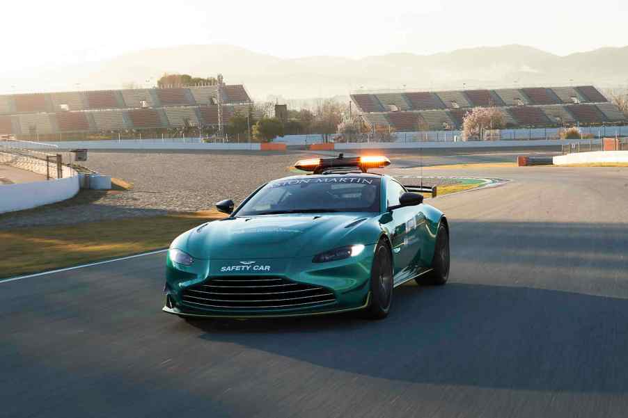 The Aston Martin Formula 1 safety car on the track, with the the Vantage F1 Edition available off-track