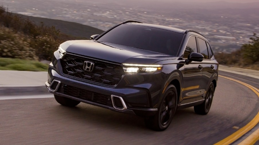 Front angle view of dark blue 2023 Honda CR-V compact SUV