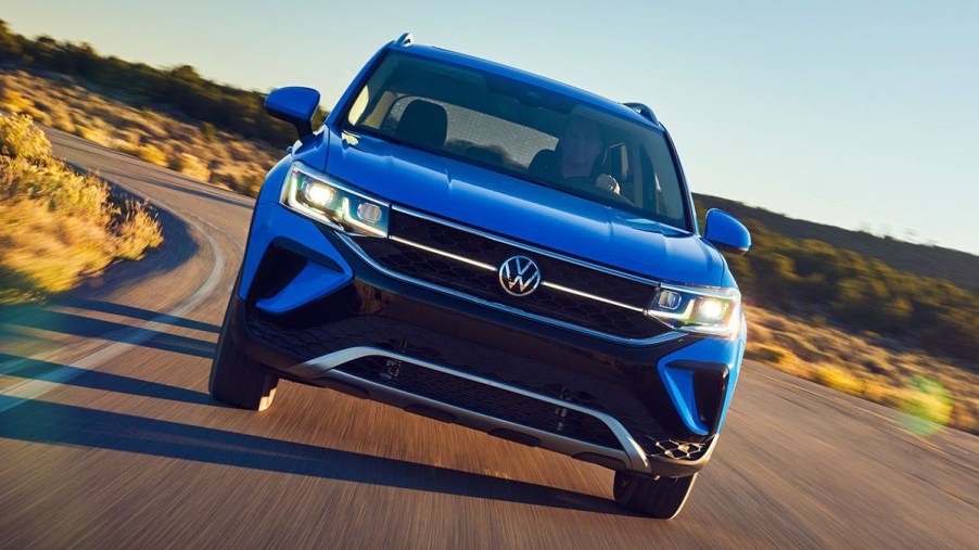 Front view of blue 2023 VW Taos subcompact, the cheapest new Volkswagen SUV