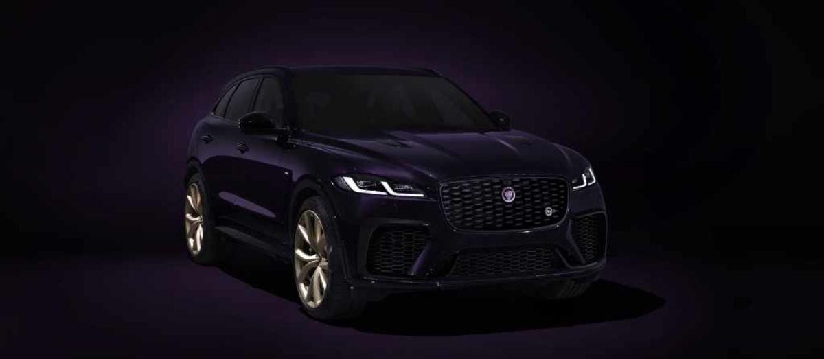 A purple Jaguar F-PACE on display.