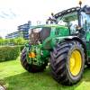 John Deere tractor sitting on grass