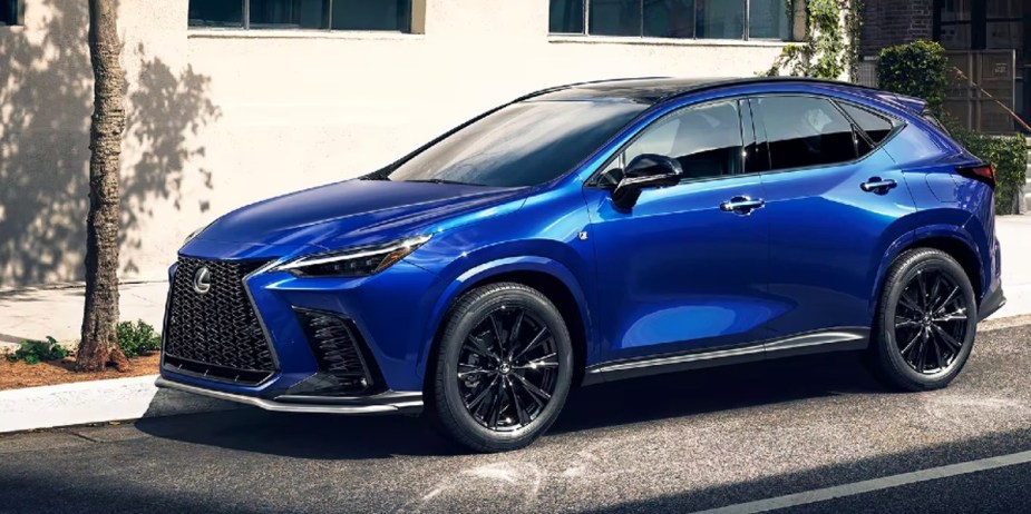 A blue 2023 Lexus UX subcompact SUV is parked. 