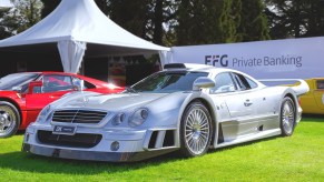 A silver Mercedes-Benz CLK GTR car at a car show