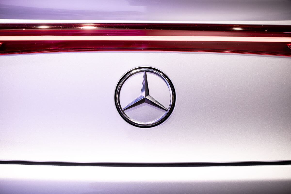 The Mercedes-Benz logo on an EQS model at the Daimler AG stand during IAA Mobility in Bavaria, Munich, Germany