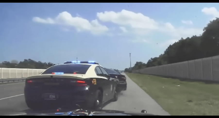 Police cruiser performing a PIT maneuver.