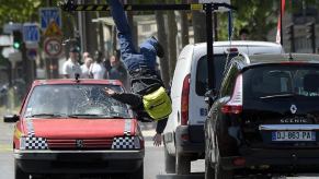 A crash test car runs into a pedestrian in a simulation.