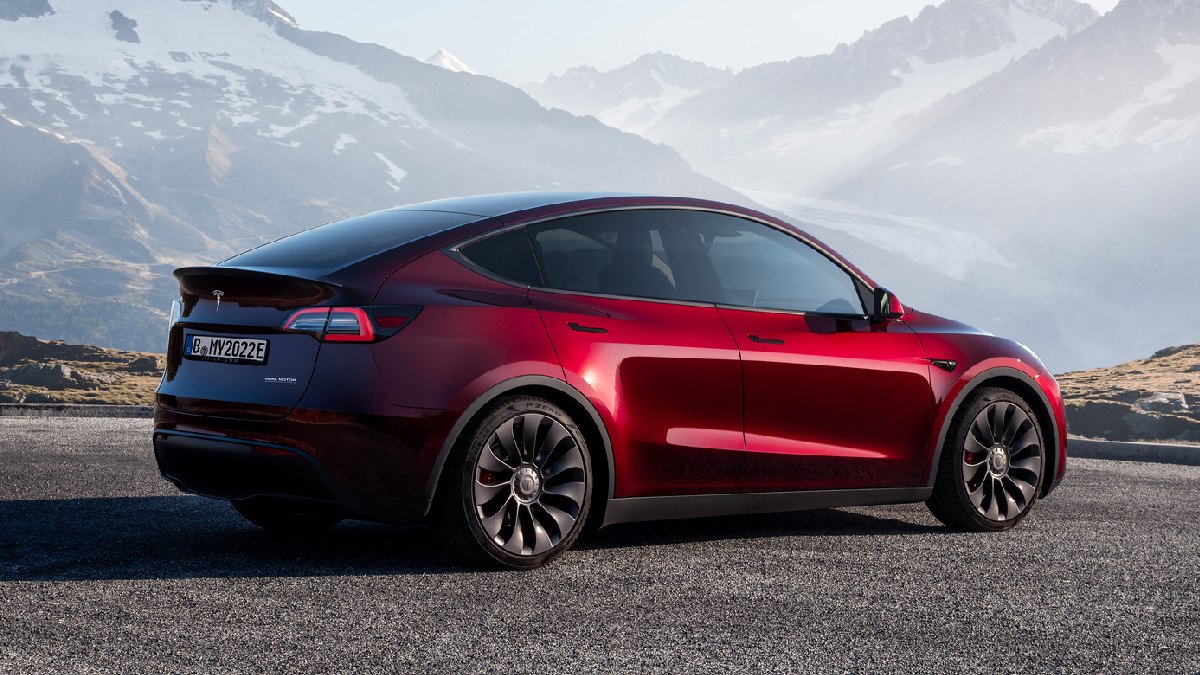 Side view of 2023 Tesla Model Y EV, cheapest new Tesla SUV and safest with IIHS Top Safety Pick+ award