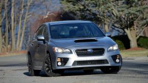 A silver 2015 Subaru WRX front view