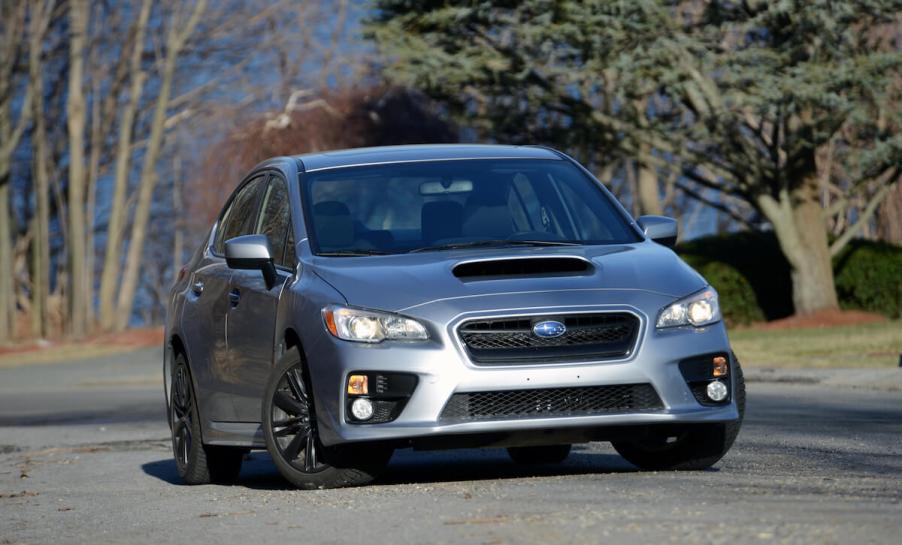 A silver 2015 Subaru WRX front view