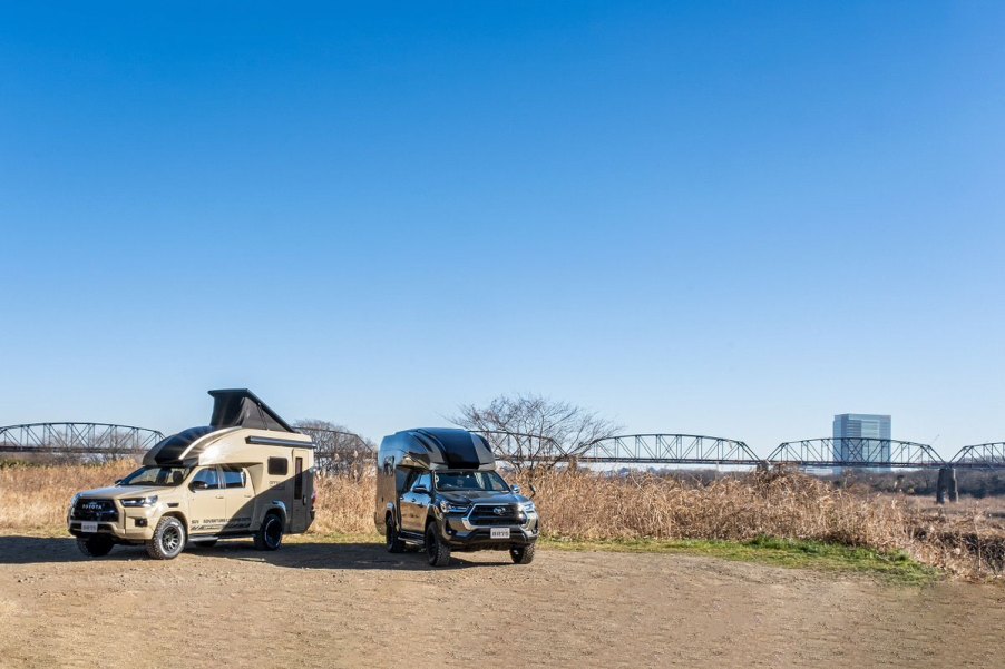 The Toyota Hilux BR75 camper conversion is on display.