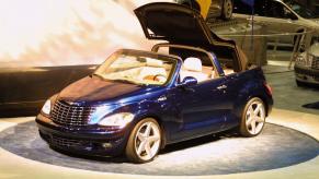 A Chrysler PT Cruiser convertible prototype compact car model on display at the 2001 New York Auto Show