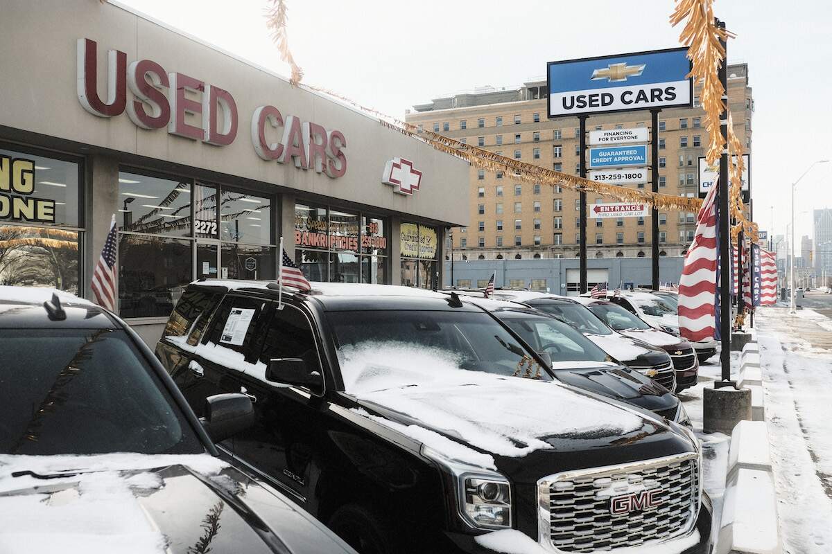 A Chevrolet used car lot covered in snow