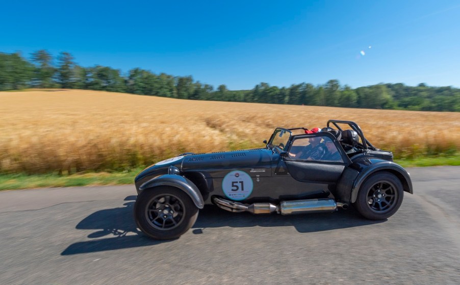 A grey caterham seven driven in a rally