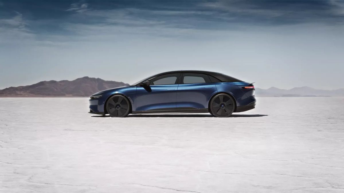 A blue Lucid Air Sapphire on a salt plain.