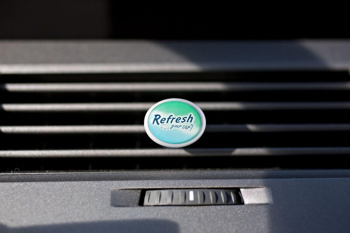 A Refresh brand car air freshener attached to a vent inside a vehicle in Tiskilwa, Illinois