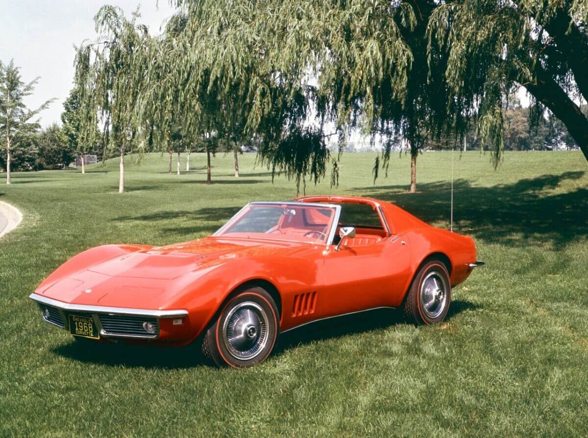 An orange 1968 Chevy Corvette shows off its removable convertible roof. 