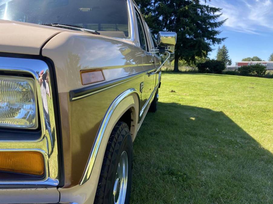 The headlight and side of a bullnose Ford F-250.