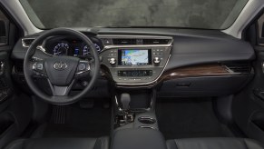 A used Toyota Avalon sedan shows off its interior.