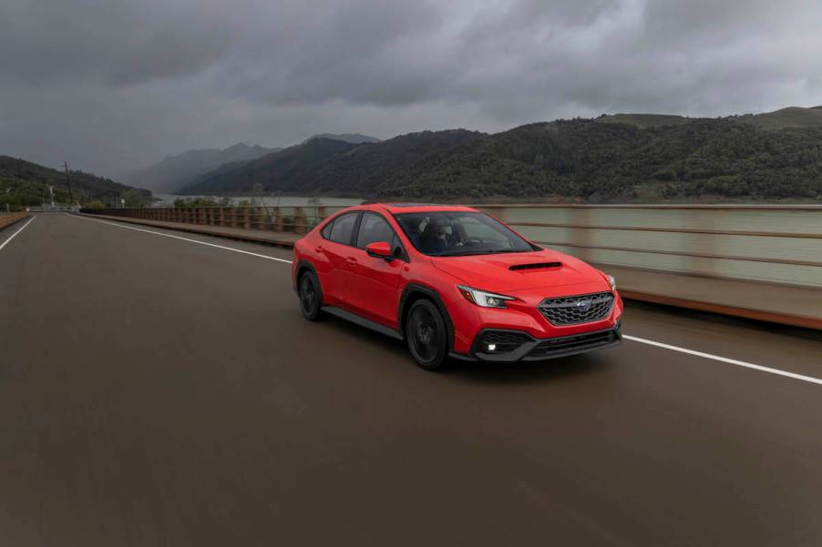 An exterior view of the 2023 Subaru WRX driving