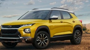 A yellow 2023 Chevrolet Trailblazer on display outside