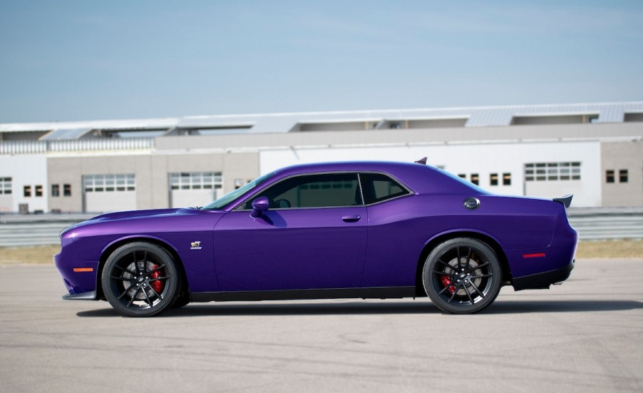 A 2023 Dodge Challenger R/T Scat Pack 1320 with a Plum Crazy paint job