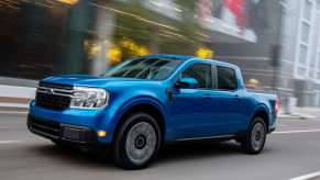 The 2023 Ford Maverick Hybrid driving in the city