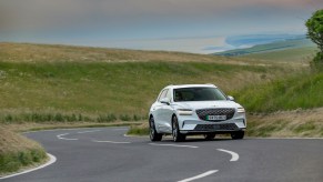 A front view of the 2023 Genesis Electrified G70 driving