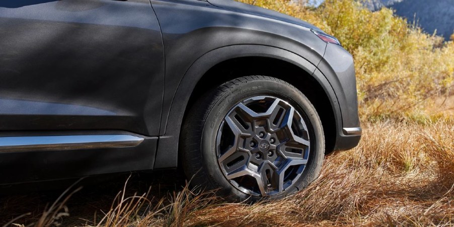 The front ride side of a 2023 Hyundai Santa Fe.