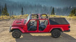 The 2023 Jeep Gladiator off-roading on a sandy trail