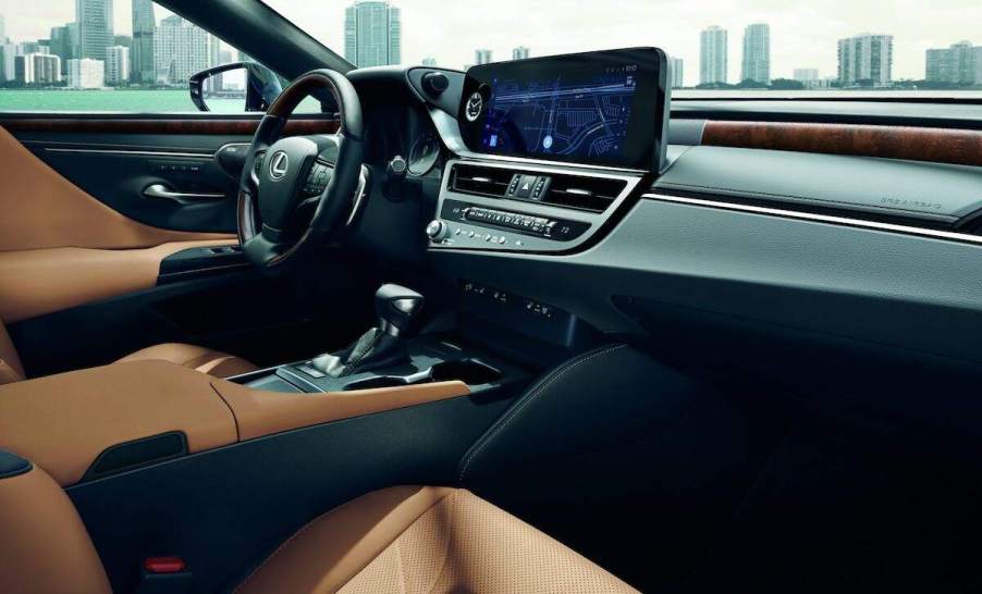 2023 Lexus ES interior view showing features and cup holders in the center console