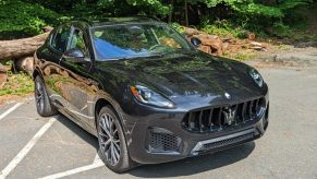 A black 2023 Maserati Grecale Modena small luxury SUV is parked.