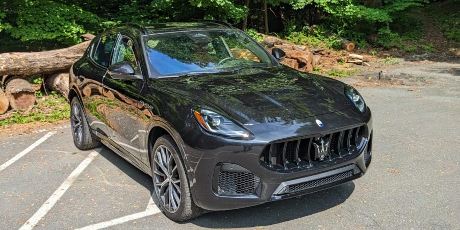 A black 2023 Maserati Grecale Modena small luxury SUV is parked.