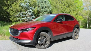 The 2023 Mazda CX-30 parked near foliage