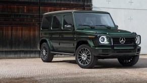 A green 2023 Mercedes-Benz G-Class is parked.