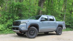 The 2023 Nissan Frontier Pro-4X off-roading in the mud