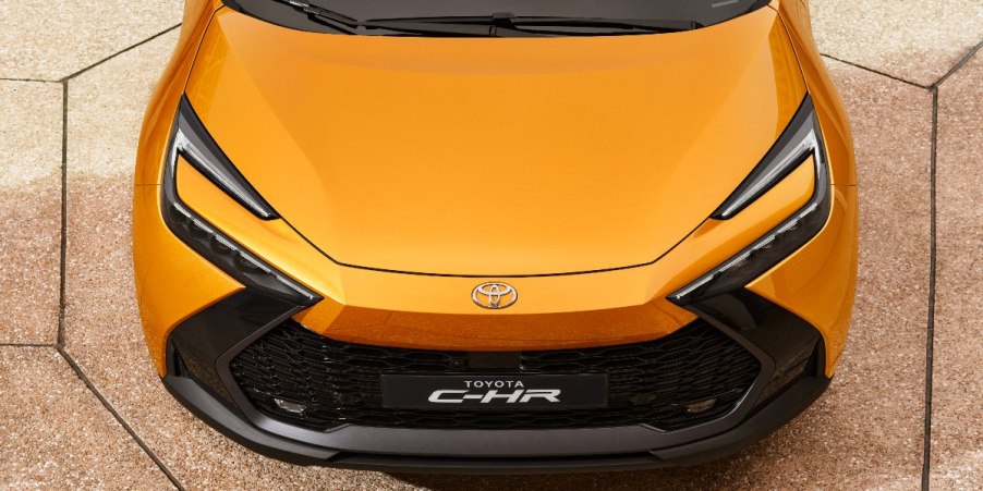 The front of an orange 2023 Toyota C-HR.