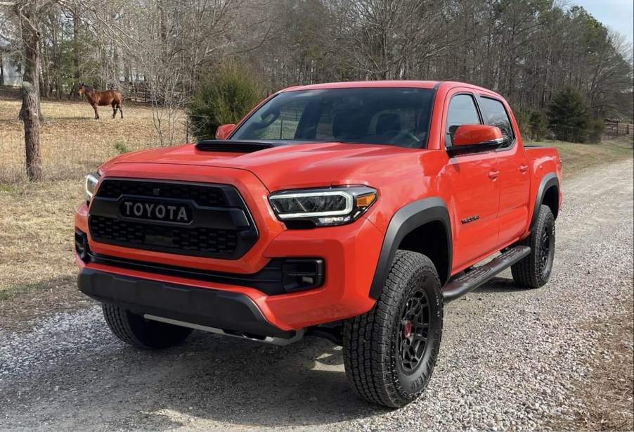 The 2023 Toyota Tacoma TRD Pro off-roading on a gravel path