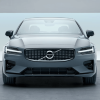 A front-facing 2023 Volvo S60 compact executive car/luxury sedan model with a background of white frames