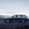 A side profile shot of a 2023 Volvo XC90 Recharge T8 AWD plug-in hybrid midsize luxury SUV in Denim Blue