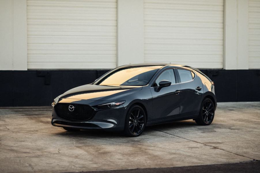 A 2024 Mazda3 Hatchback model with a dark gray paint color option