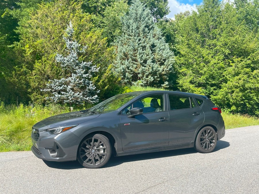 The 2024 Subaru Impreza RS parked outside on a sunny day