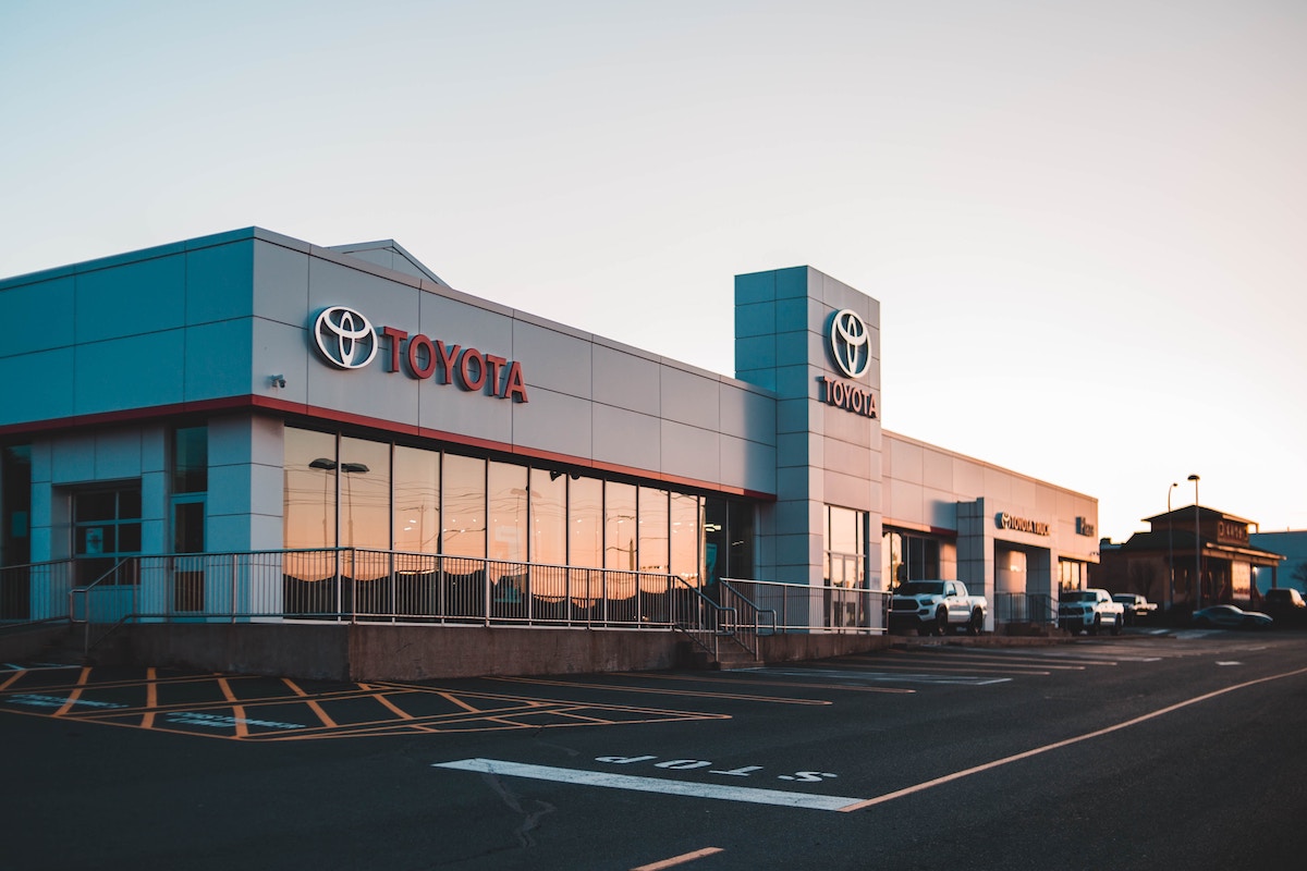 A Toyota car dealership at dusk