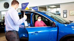 A certified pre-owned vehicle in a Ford showroom