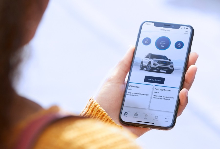 A person using FordPass on their phone