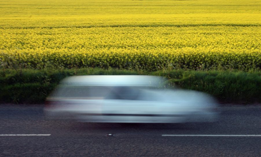 Blurred car speeding