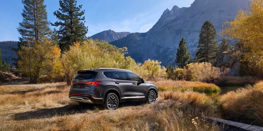 The back of a gray 2023 Hyundai Santa Fe, the most affordable midsize SUV.