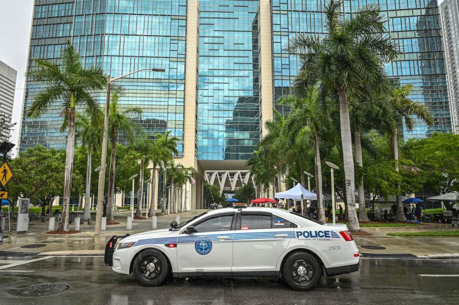 A police car equipped with a push bumper sits in front of the Wilkie D. Ferguson Jr. United States Federal Courthouse in Miami