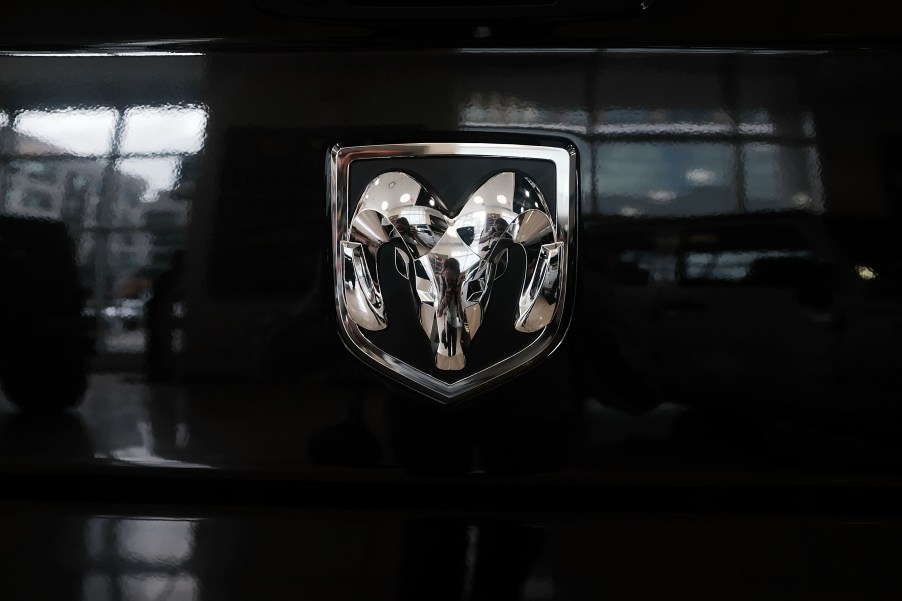 A RAM truck logo is displayed on a truck at a Manhattan Fiat Chrysler dealership