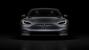 A Tesla Model S flashes its running lights.